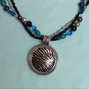 “Safari” zebra striped enhancer/pendant by Premier Designs